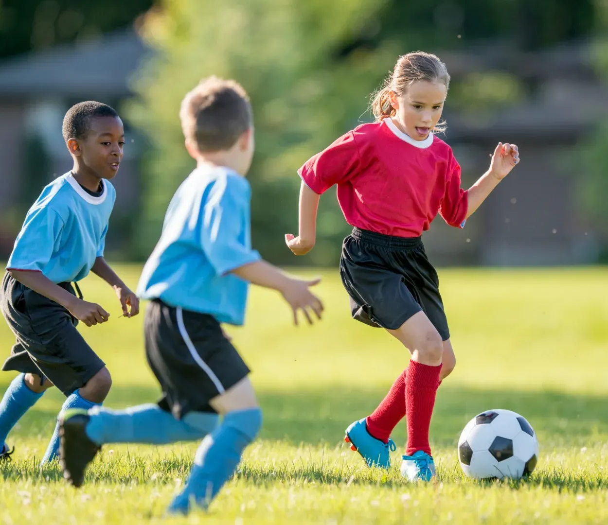children playing soccer
