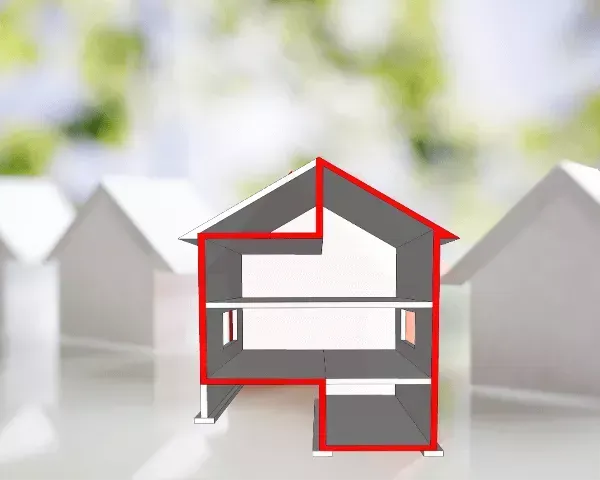 A model of a house cut in half with a red outline.