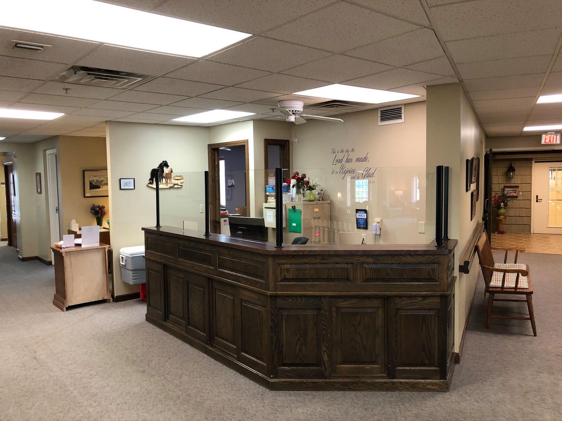 A large room with a wooden counter in the middle of it