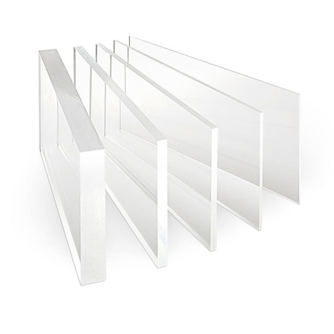 A group of clear acrylic sheets stacked on top of each other on a white background.