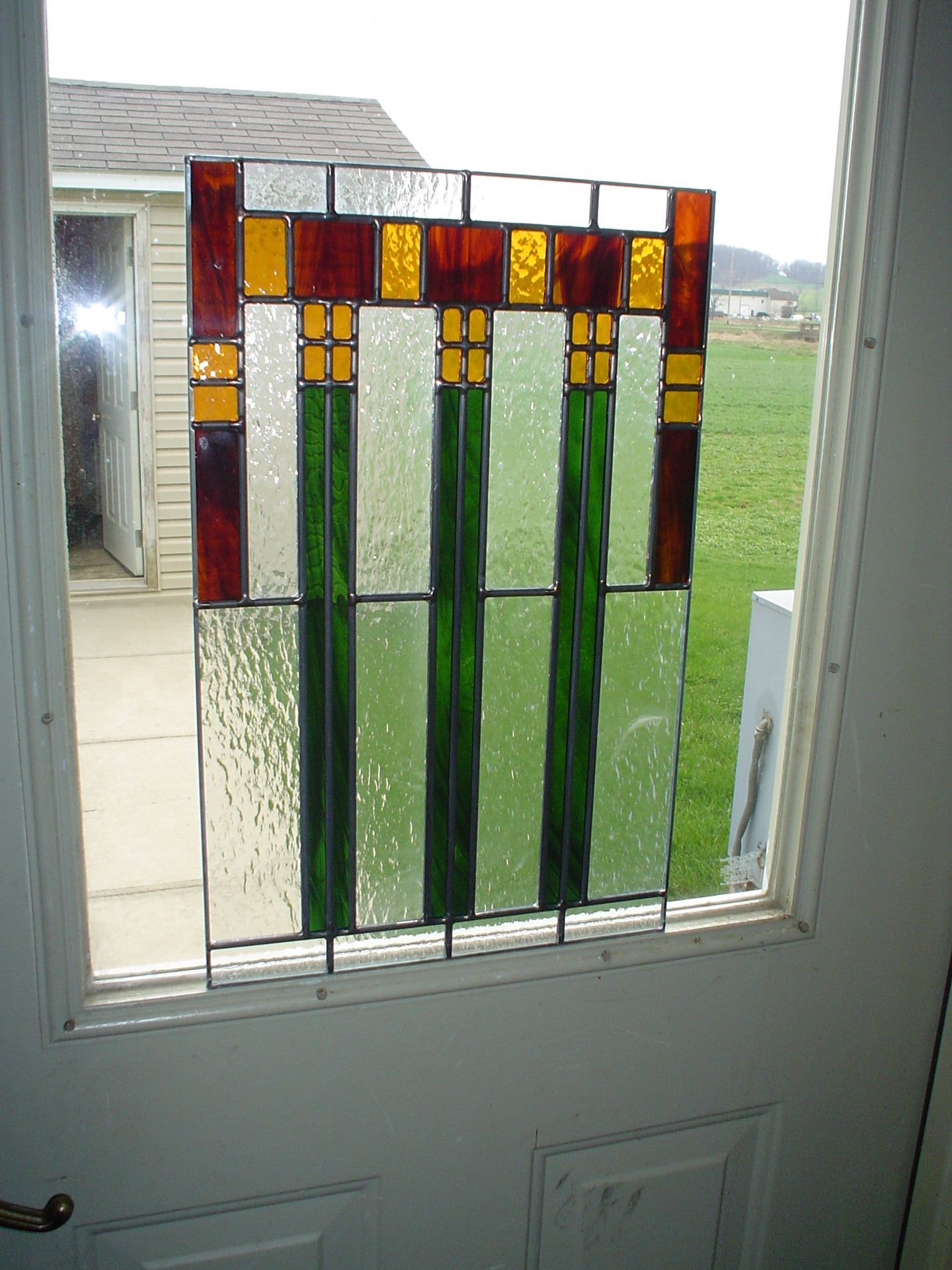 A door with a stained glass window in it