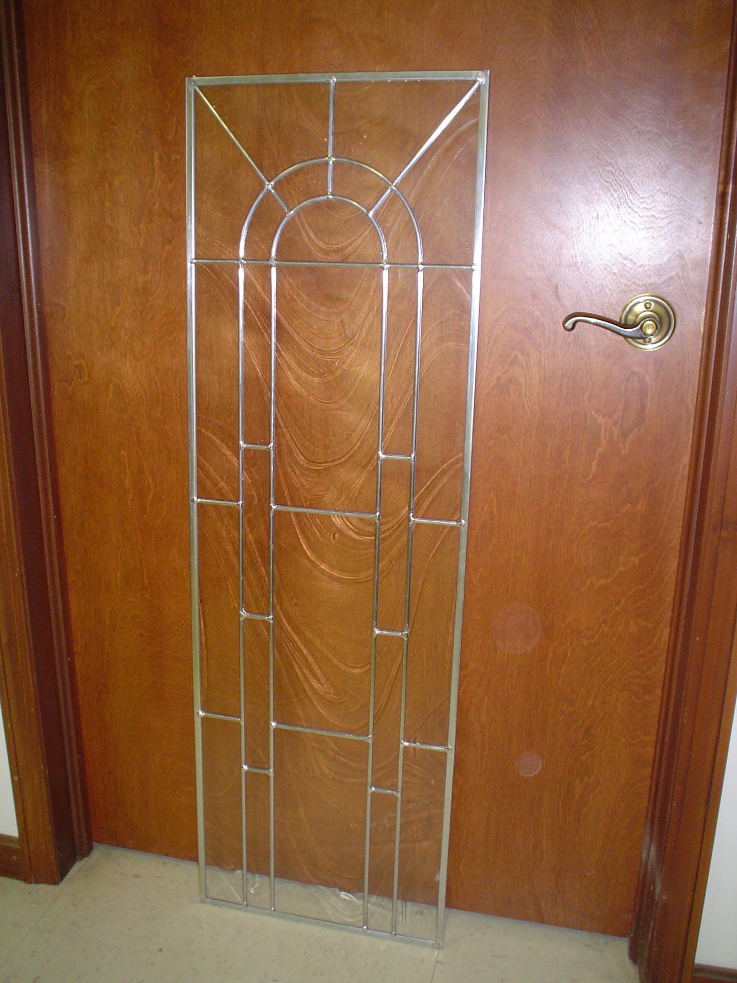 A door with a stained glass window on it