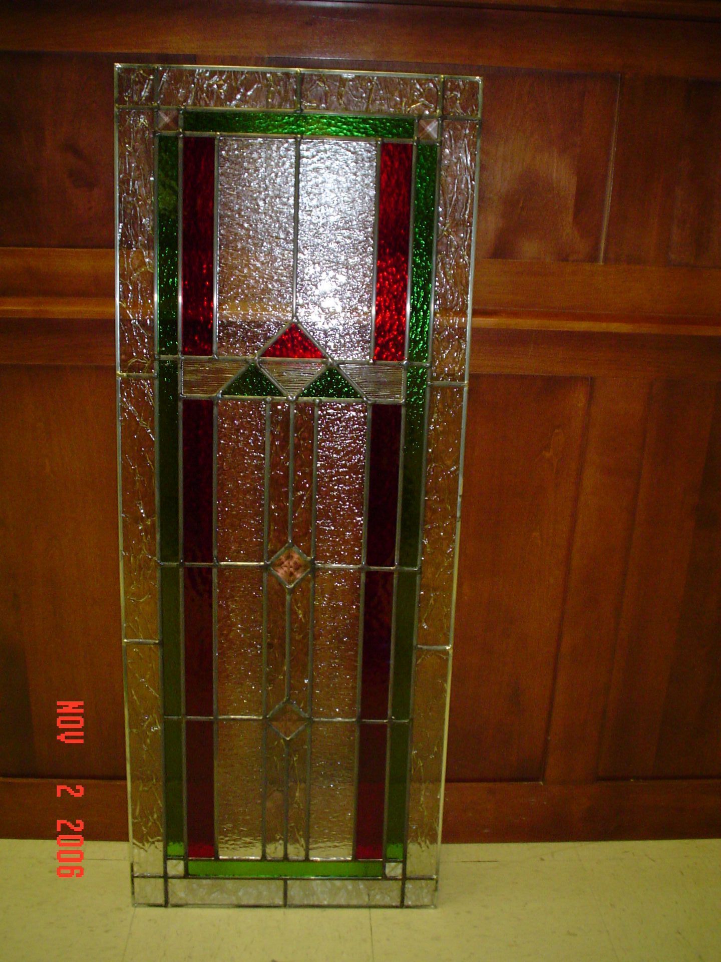 A picture of a stained glass window was taken on april 2 2008