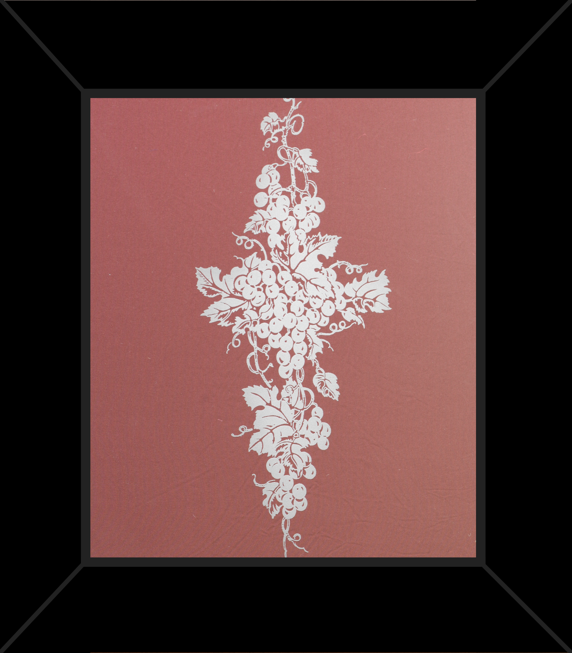 A picture of a cross with white flowers on a red background