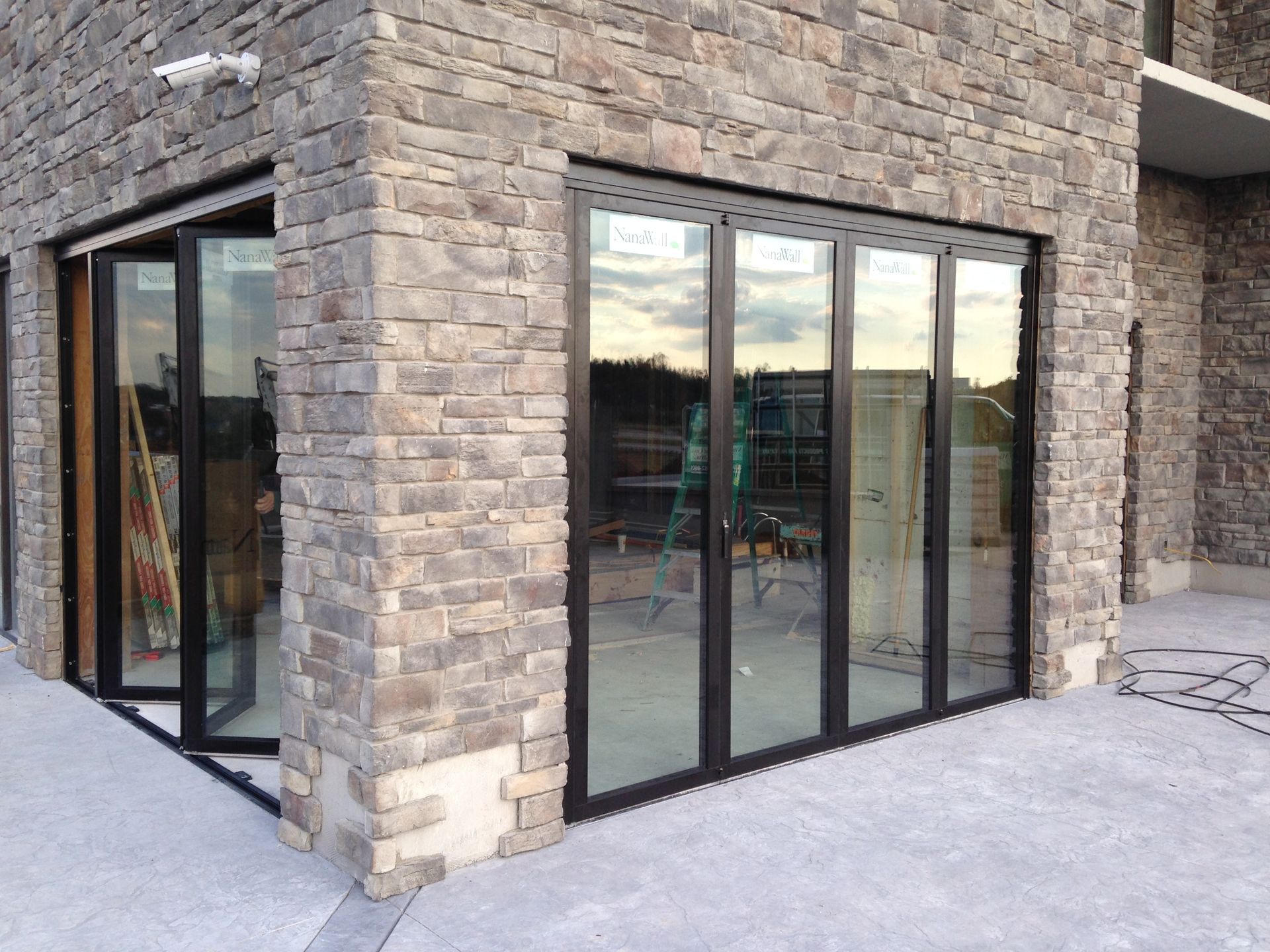 A brick building with a lot of windows on it