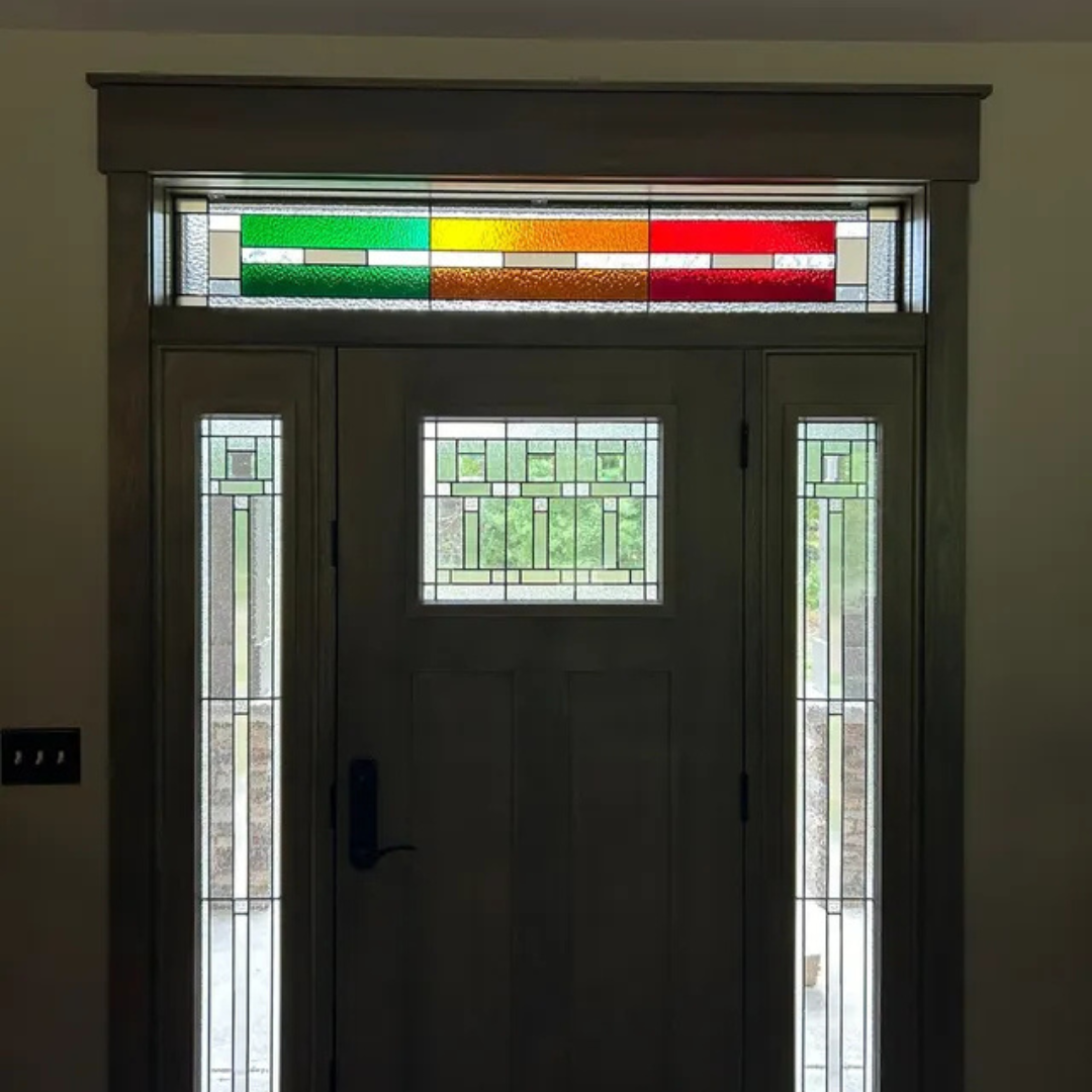 A door with a stained glass window above it