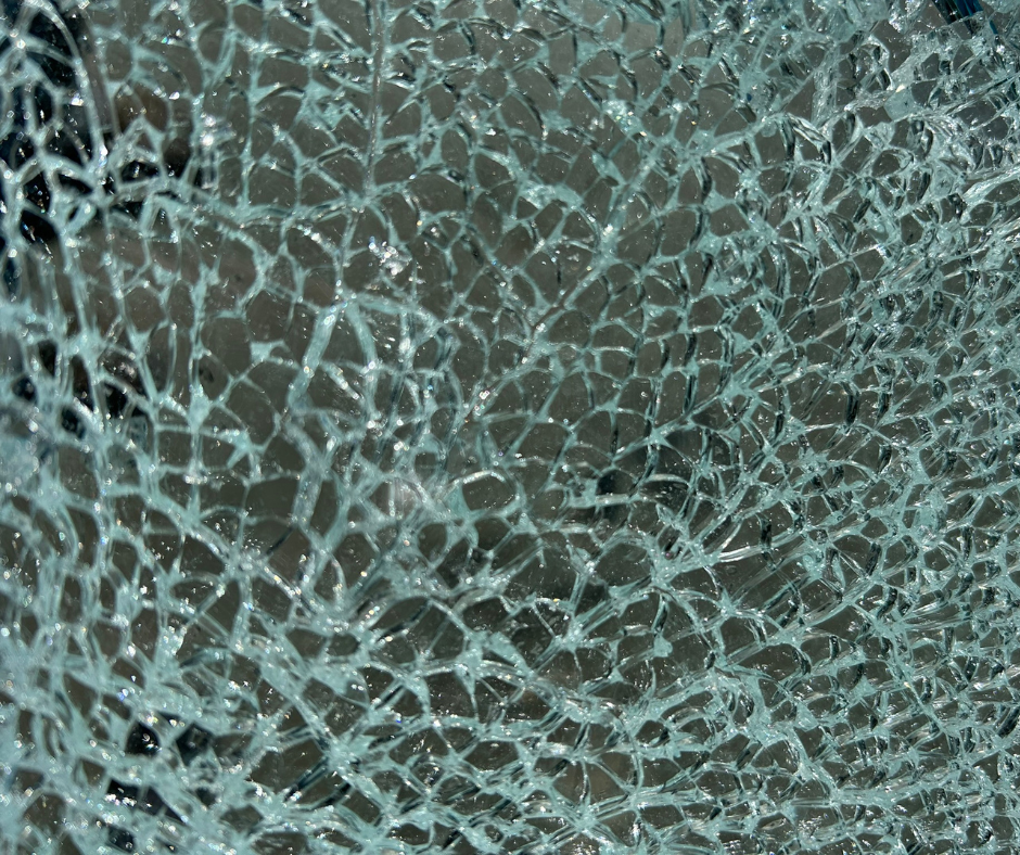 A close up of a piece of broken glass