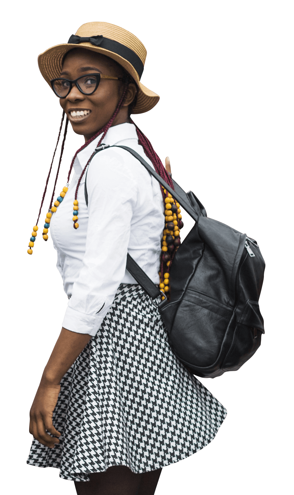 A woman wearing a hat and glasses is carrying a backpack.