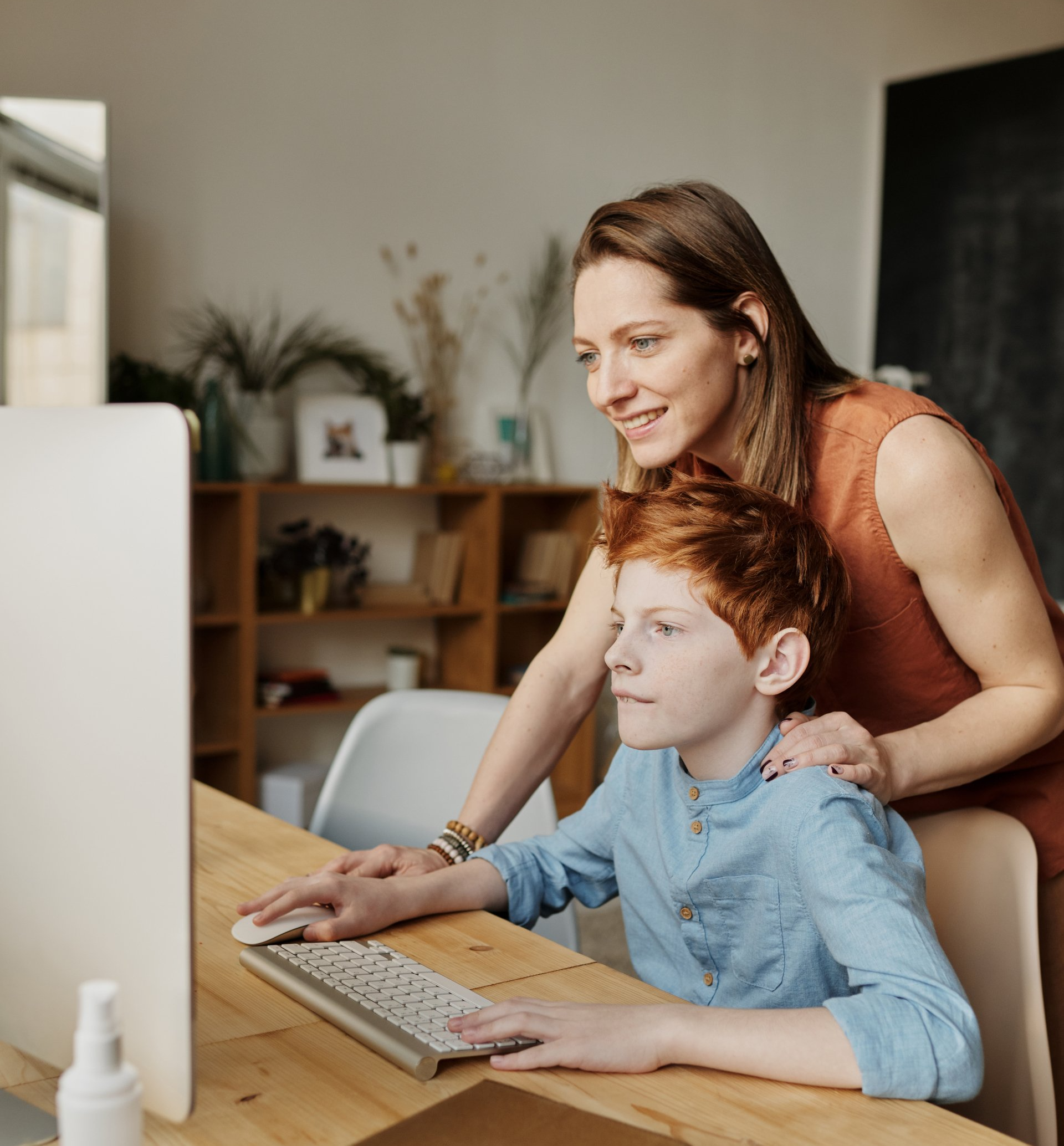 Student and parent looking at computer