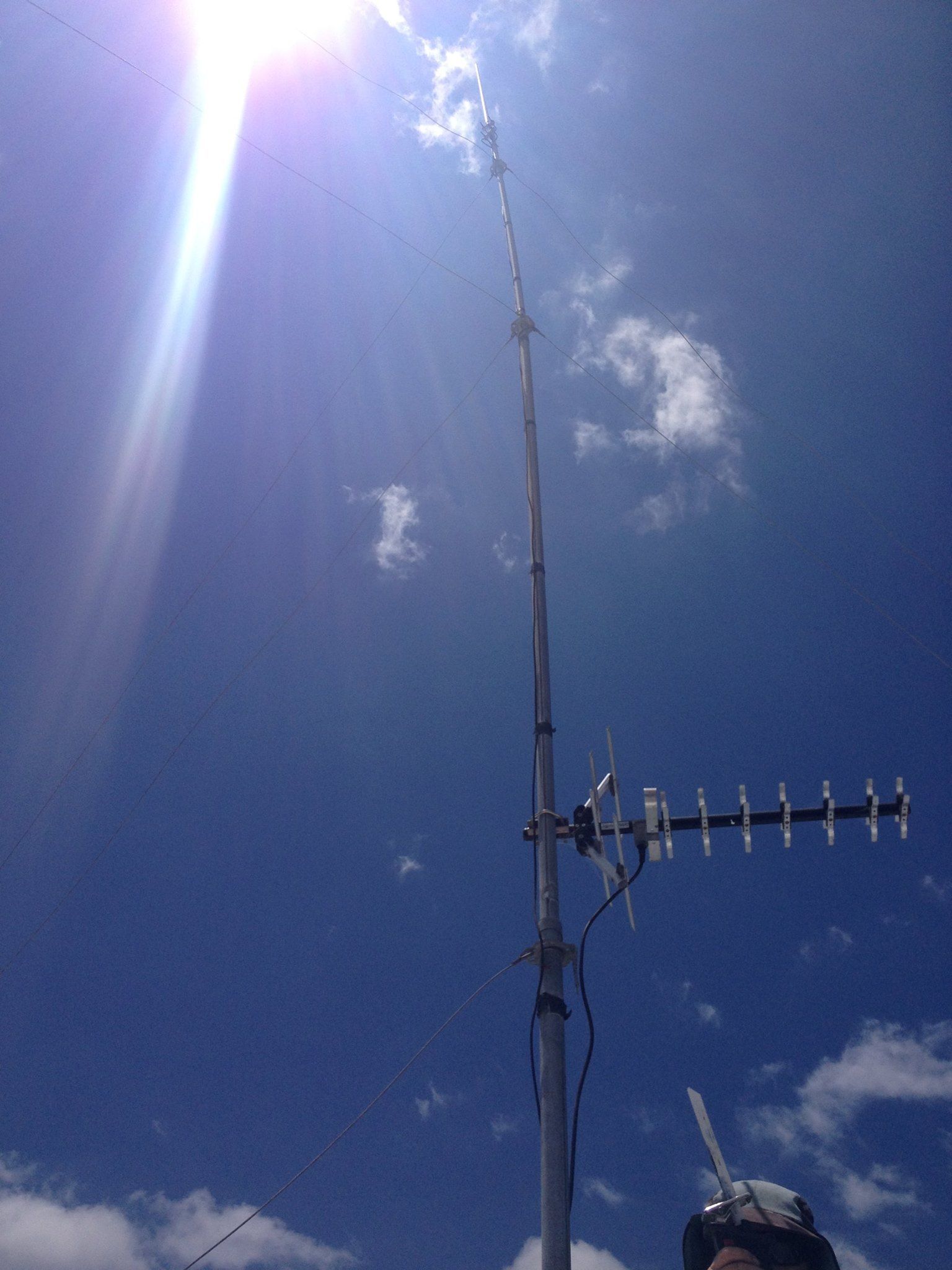Radio Antenna on a Pole Against a Bright Blue Sky — BRC Antenna Service 1 In Kingscliff, NSW