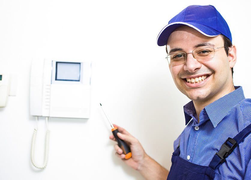 electrician in blue uniform