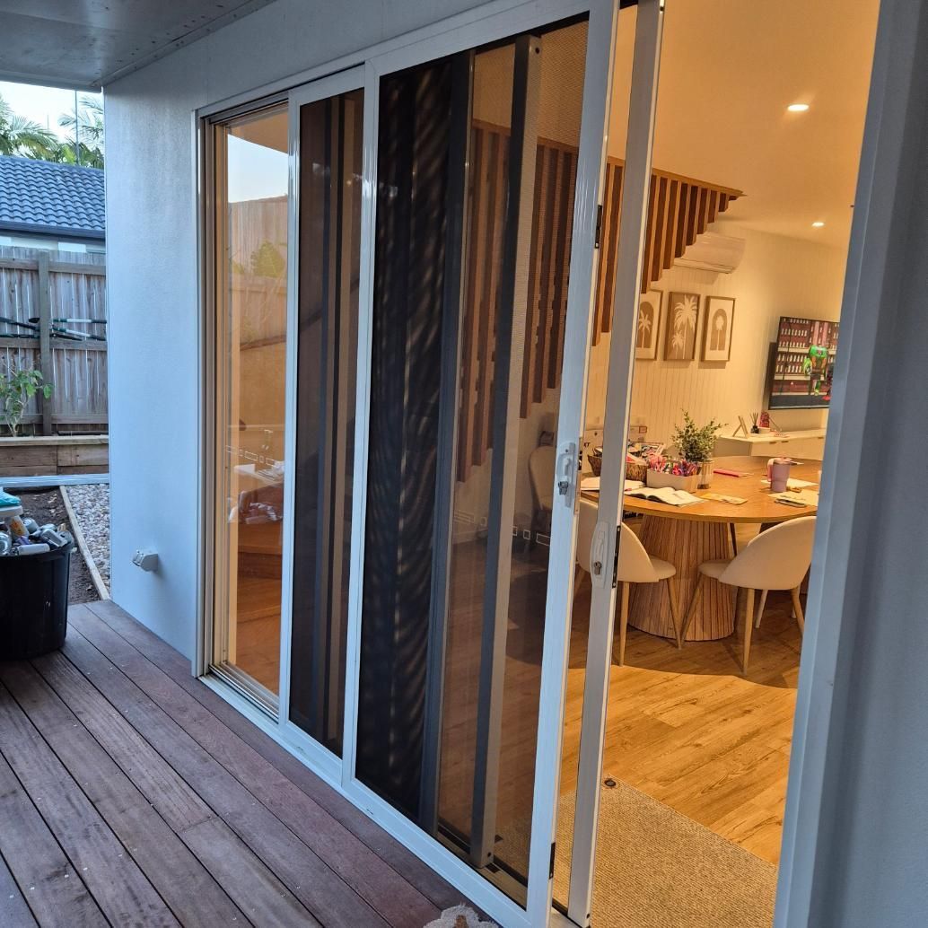 White Sliding Door — Hervey Bay Glass Glazing & Screens In Maryborough, QLD