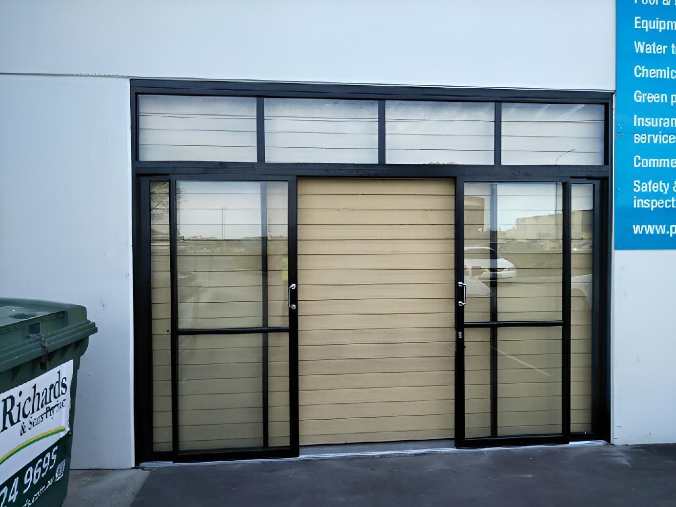 Black-framed Entrance With Sliding and Glass Doors — Hervey Bay Glass Glazing & Screens In Pialba, QLD