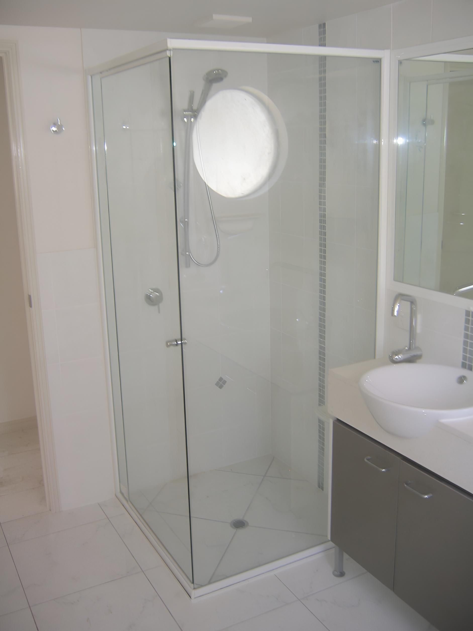 Modern Bathroom With Shower Screen Installed — Hervey Bay Glass Glazing & Screens In Maryborough, QLD