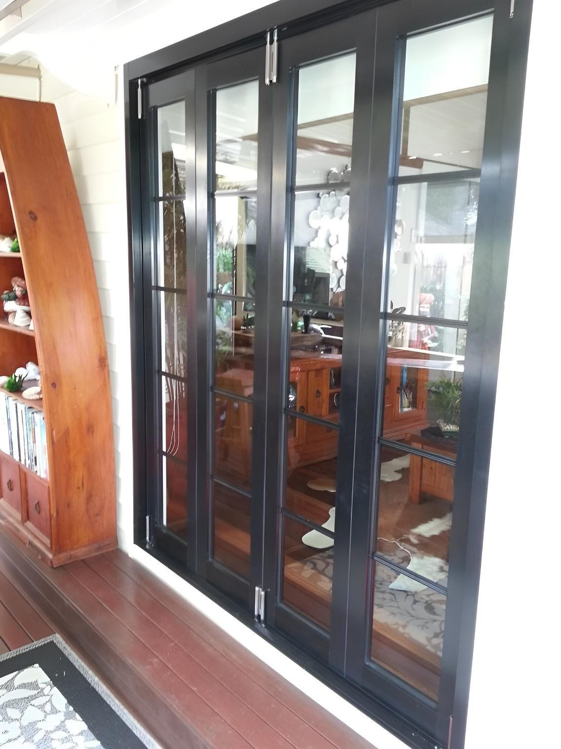Glass Door With Black Frame — Hervey Bay Glass Glazing & Screens In Maryborough, QLD