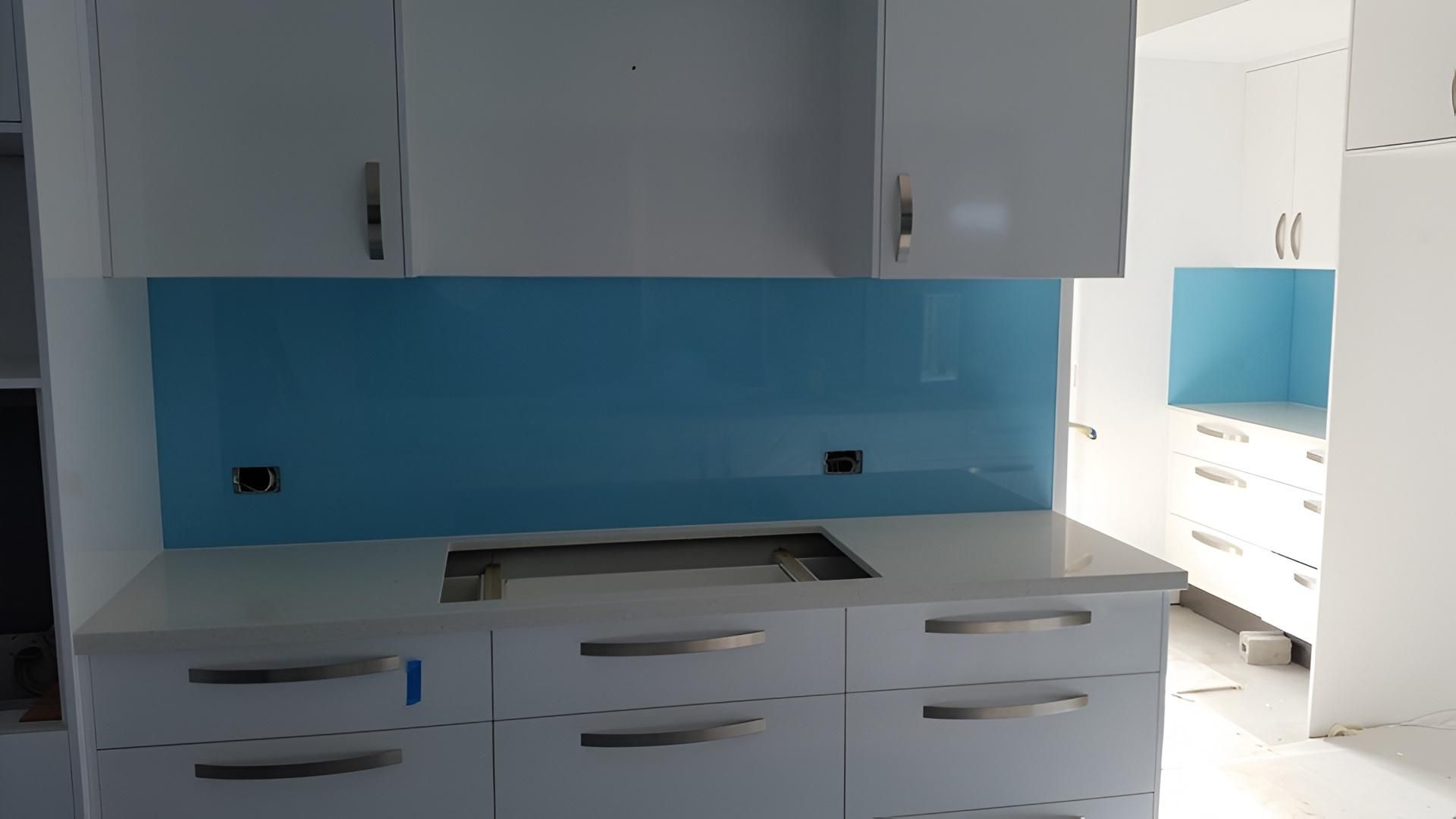 Kitchen With White Cabinets, Light Blue Backsplash — Hervey Bay Glass Glazing & Screens In Pialba, QLD