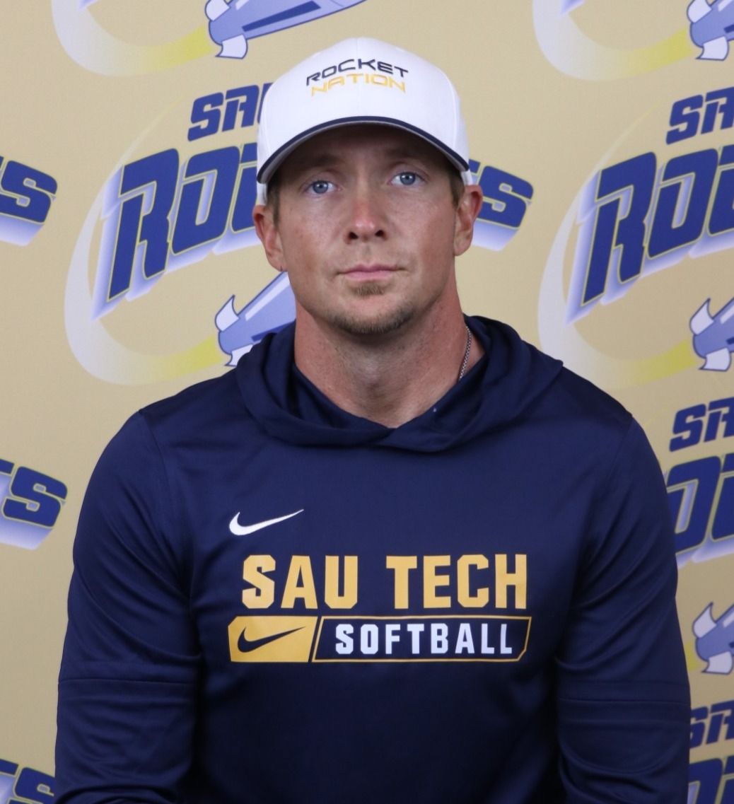 Matthew Payne wearing SAU Tech Softball gear poses for official photo as Interim Head Softball Coach