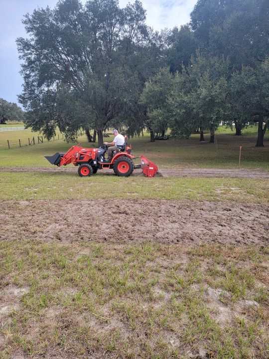 The inside of a moving truck filled with boxes and blankets.