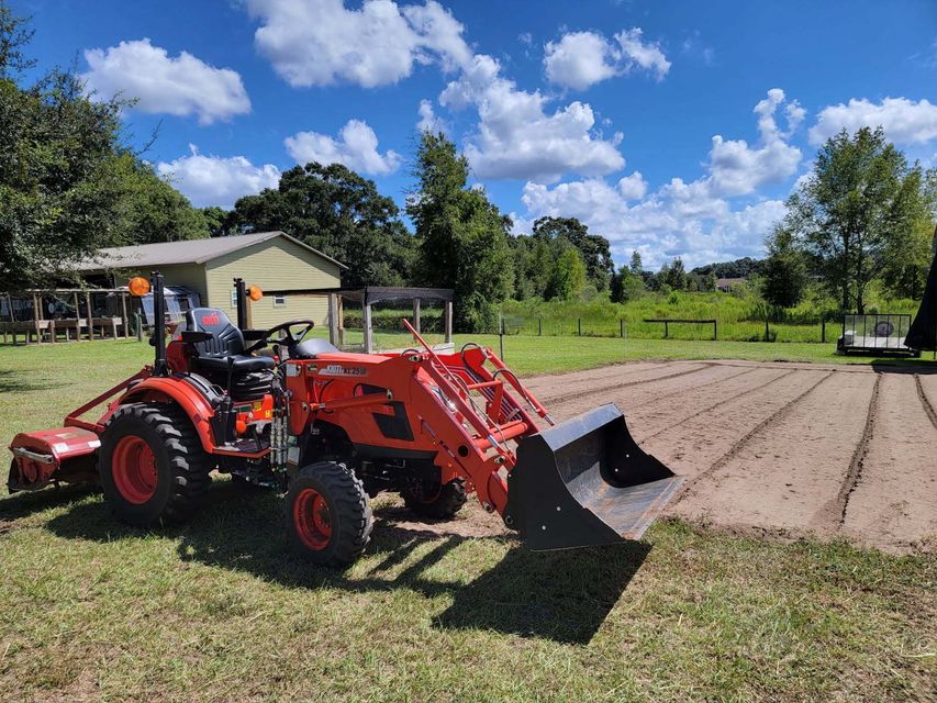 The inside of a moving truck filled with boxes and blankets.