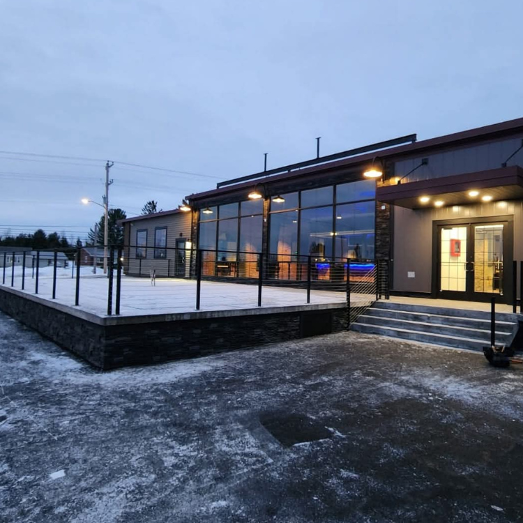 A large building with a lot of windows and stairs