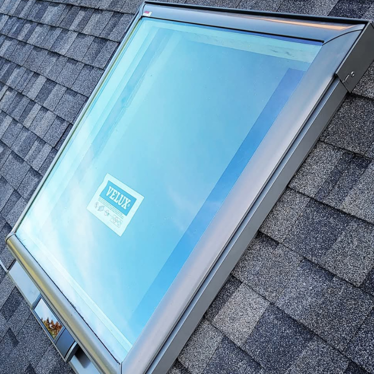 A skylight with a Velux sticker on it