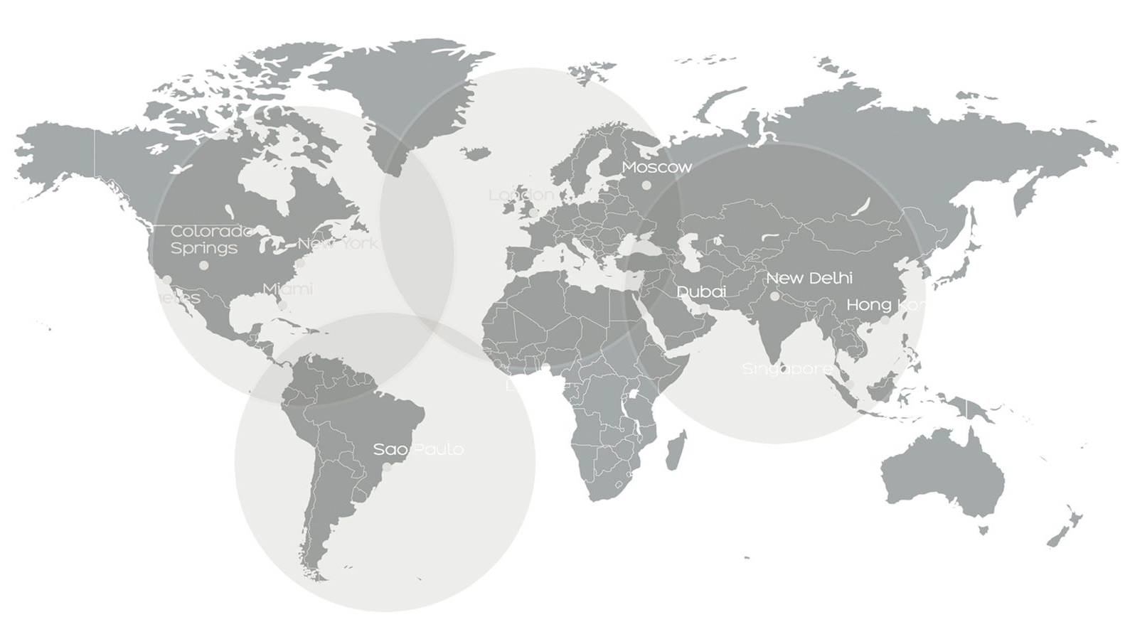 World map with overlapping grey circles, indicating global distribution areas.