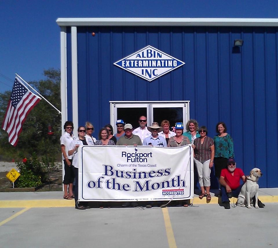 Pest Management  —People Holding Business Of The Month Poster in Rockport,TX