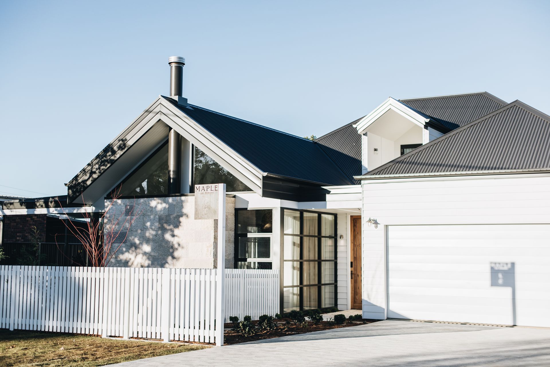 White House Exterior With Dark-framed Window — Stark Building & Constructions In Berry, NSW