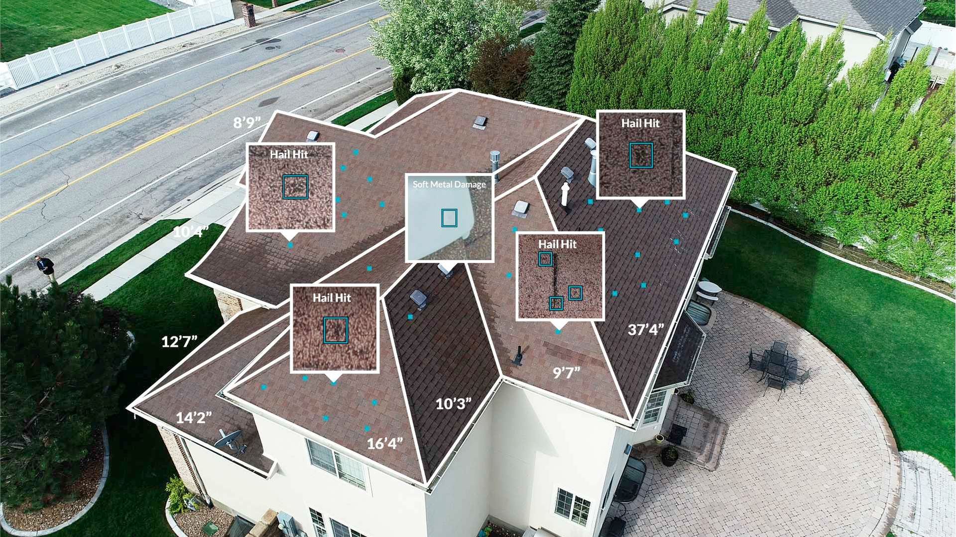 An aerial view of a large house with a roof that has a lot of squares on it.