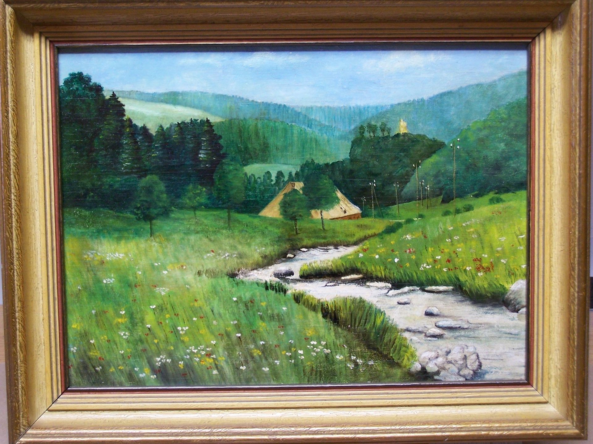 A painting of a river running through a grassy field