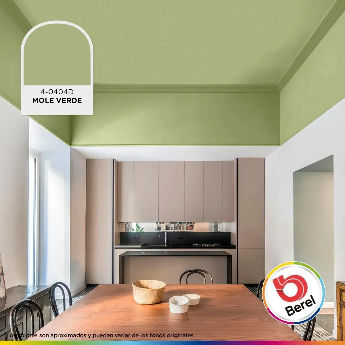 Una cocina con mesa y sillas y un techo verde.