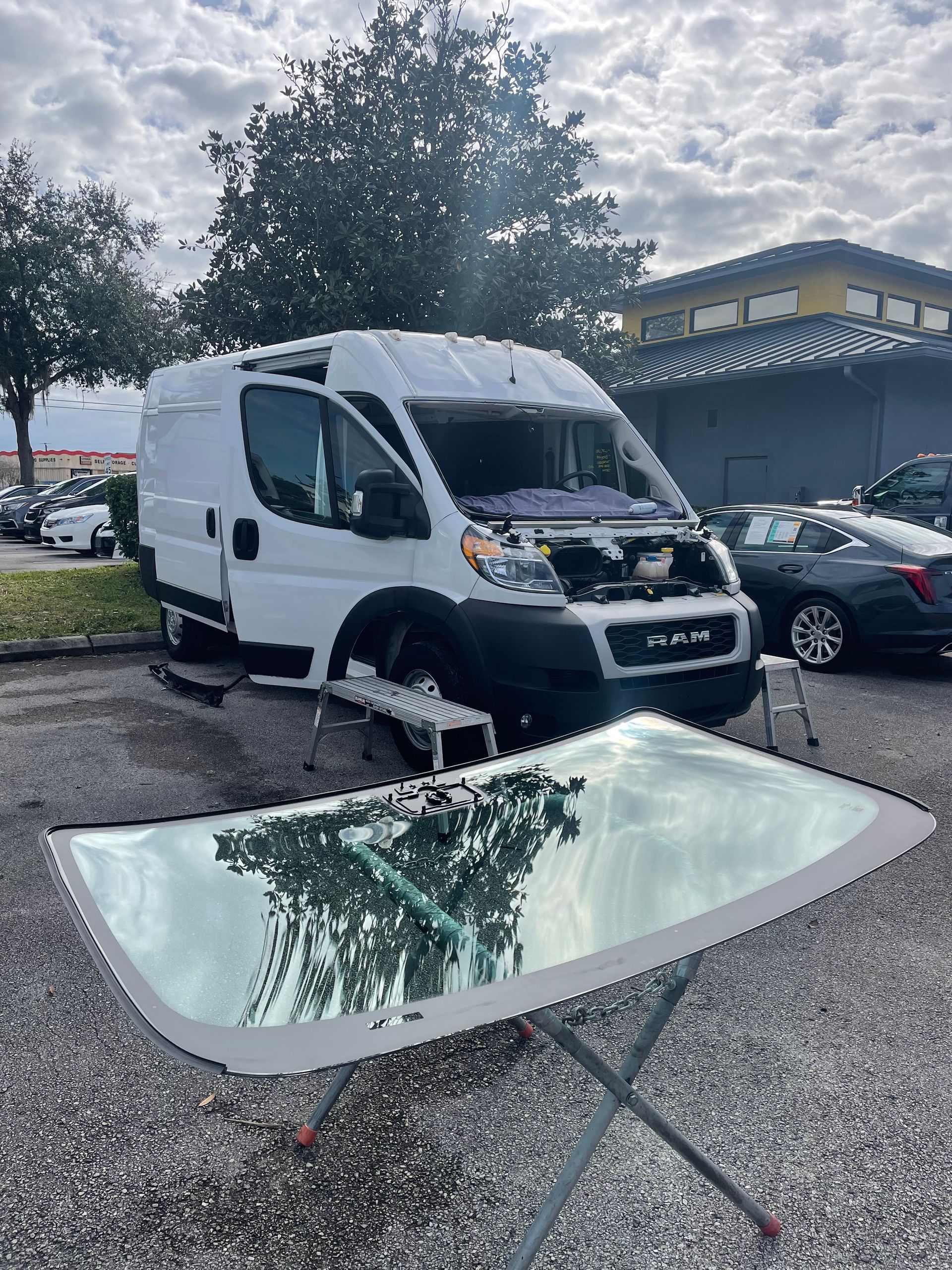 Stat Auto Glass Replacing a Windshield on a Fleet Van in Orlando