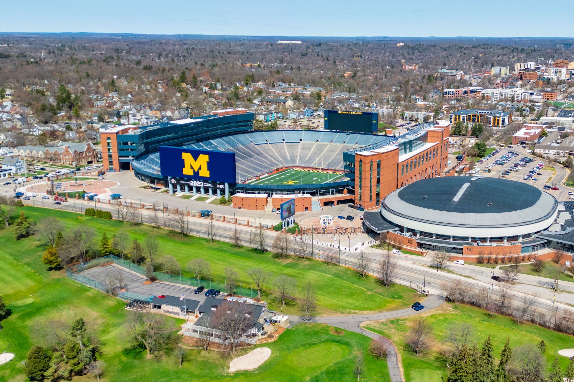 Aerial view of Michigan Stadium, a 10-minute walk from Stadium Suites Ann Arbor