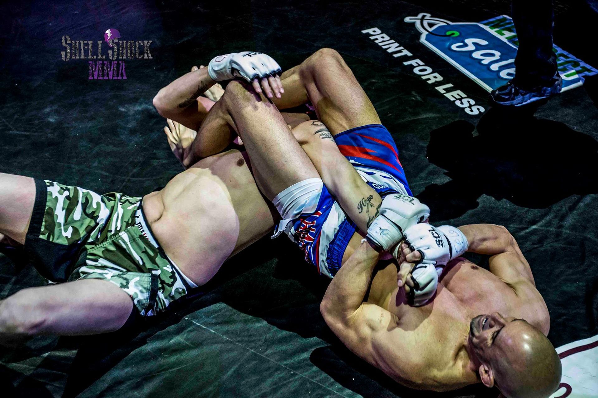 Law enforcement trainerJerrod Hardy perfoming an armbar in a mixed martial arts fight