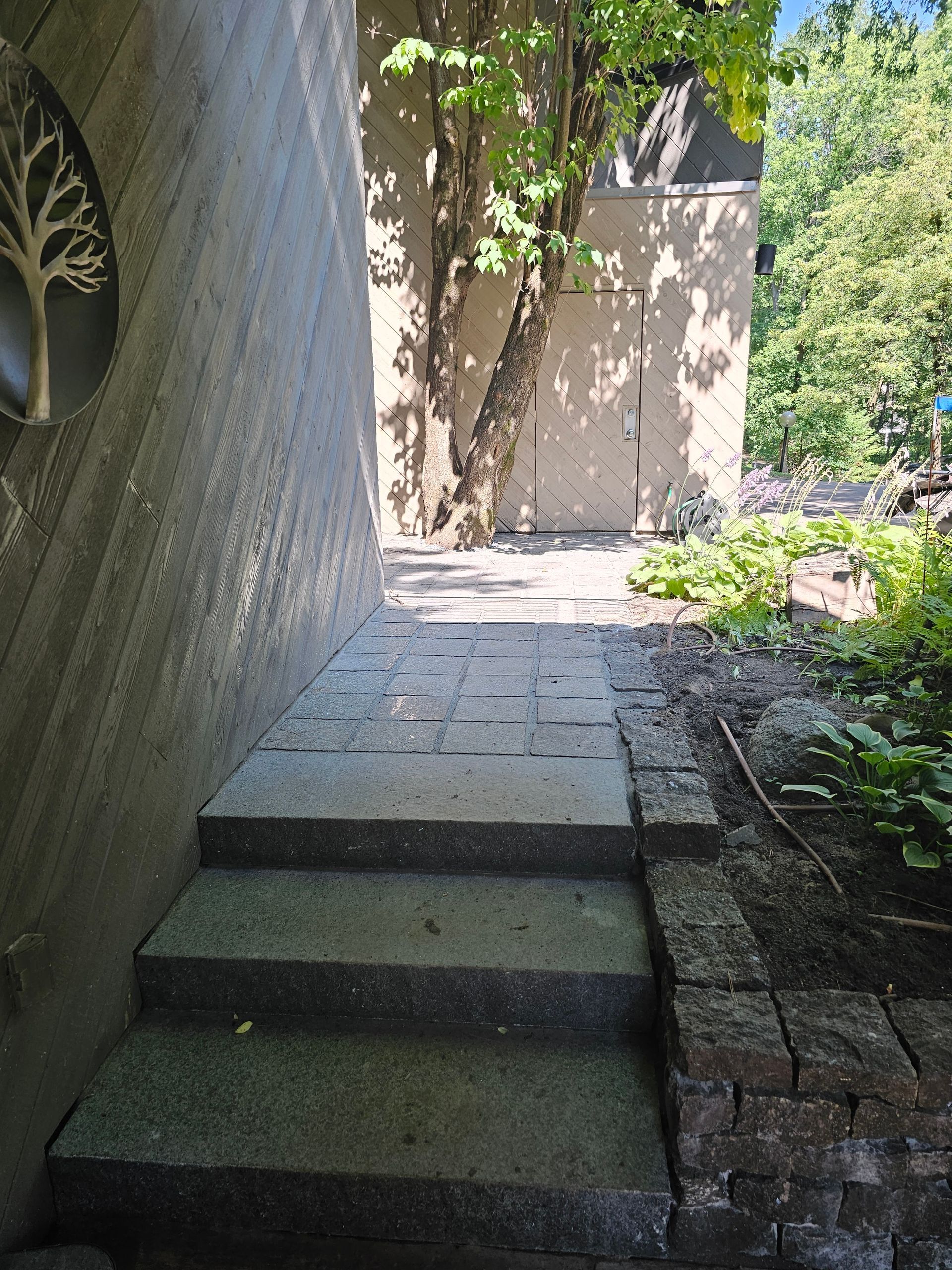 A set of stairs leading up to a building