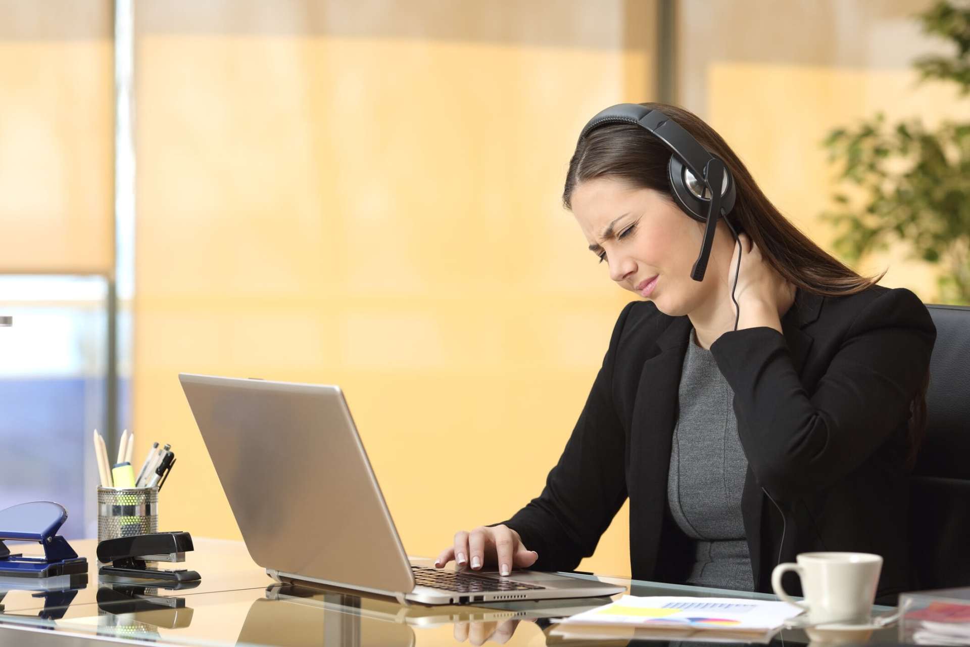 Woman with Neck Pain at Work - Employer Health Care - Visalia, CA