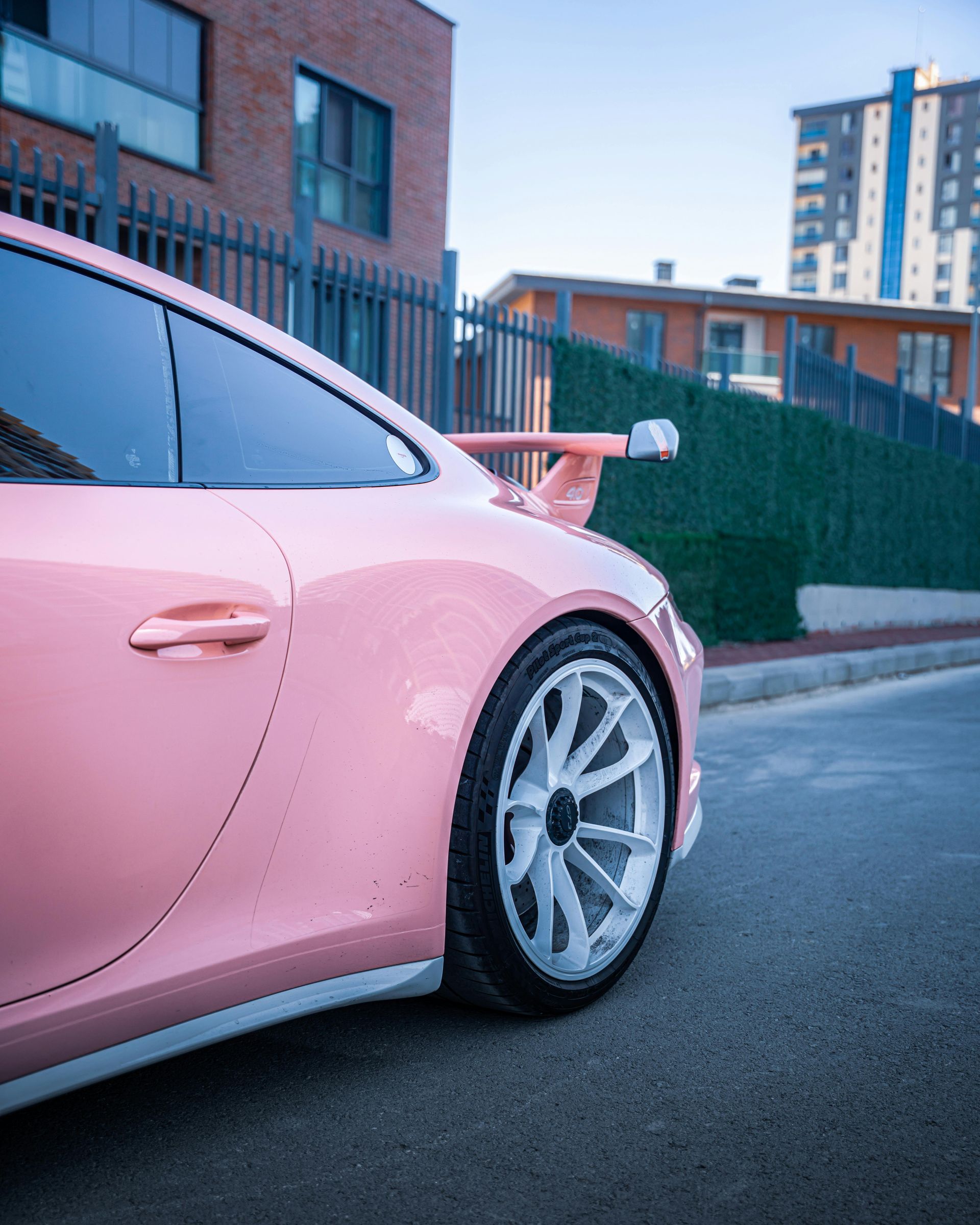 Sandstone canyon walls in shades of red and orange, with light streaming from above.
