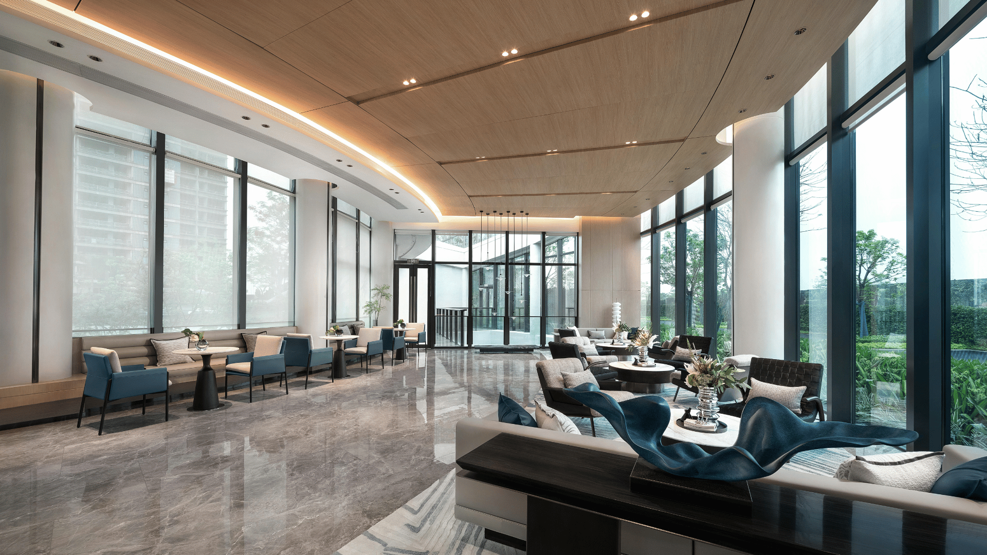 Man in gloves and safety glasses repairs water heater in a room.