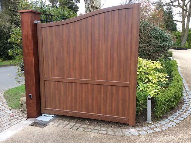 half open woodgrain gates