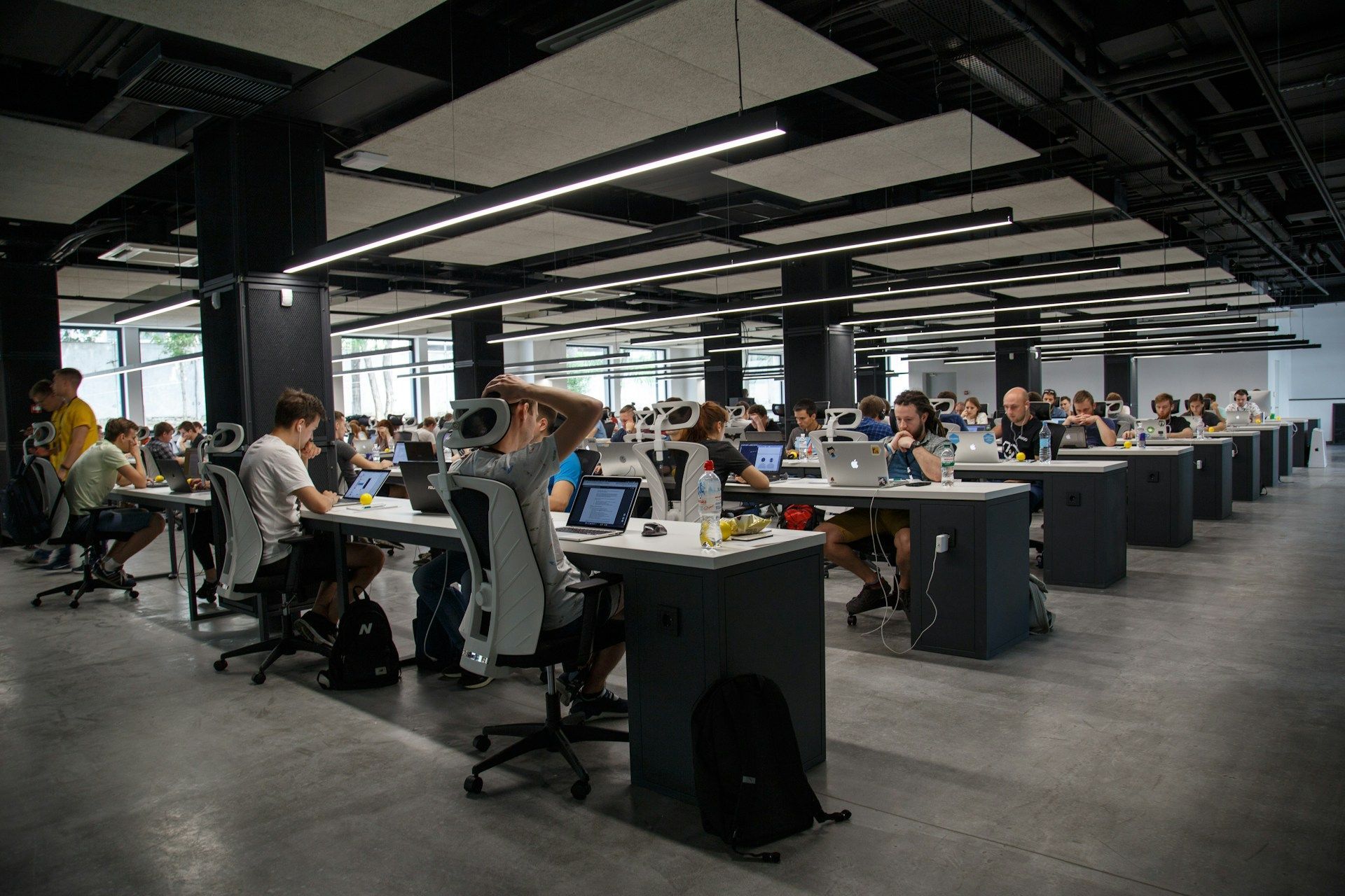 An office full of workers at their desks