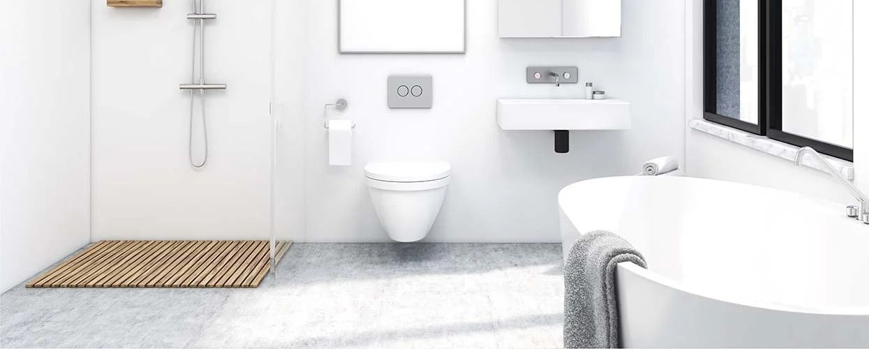 A modern, minimalist bathroom with a walk-in shower, wall-mounted toilet, floating sink, and freestanding tub.