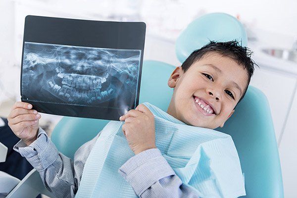 Boy Smiling — in Dental Care in Madisonville, KY