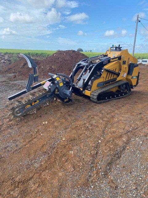 excavator for trench digging — Plumbing And Gas Services In Bundaberg, QLD