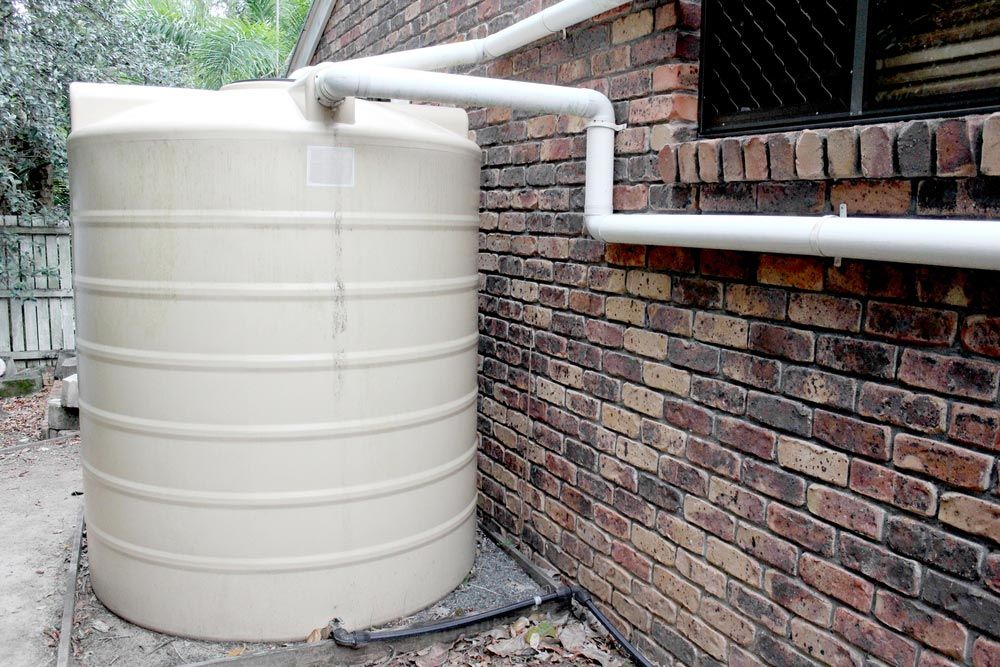 Suburban Water Tank — Plumbing And Gas Services In Bundaberg, QLD