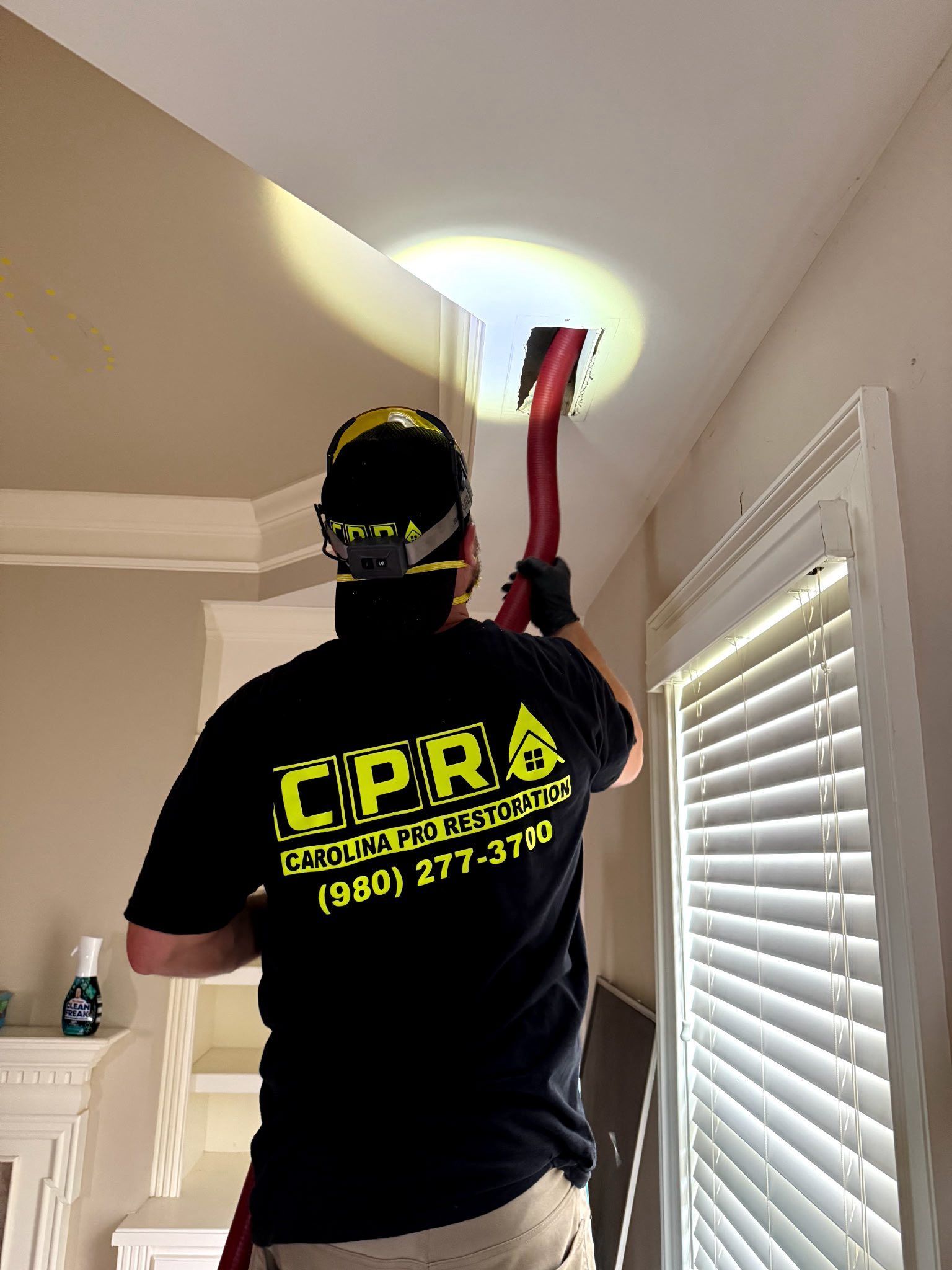 Carolina Pro Restoration technician performing professional duct cleaning