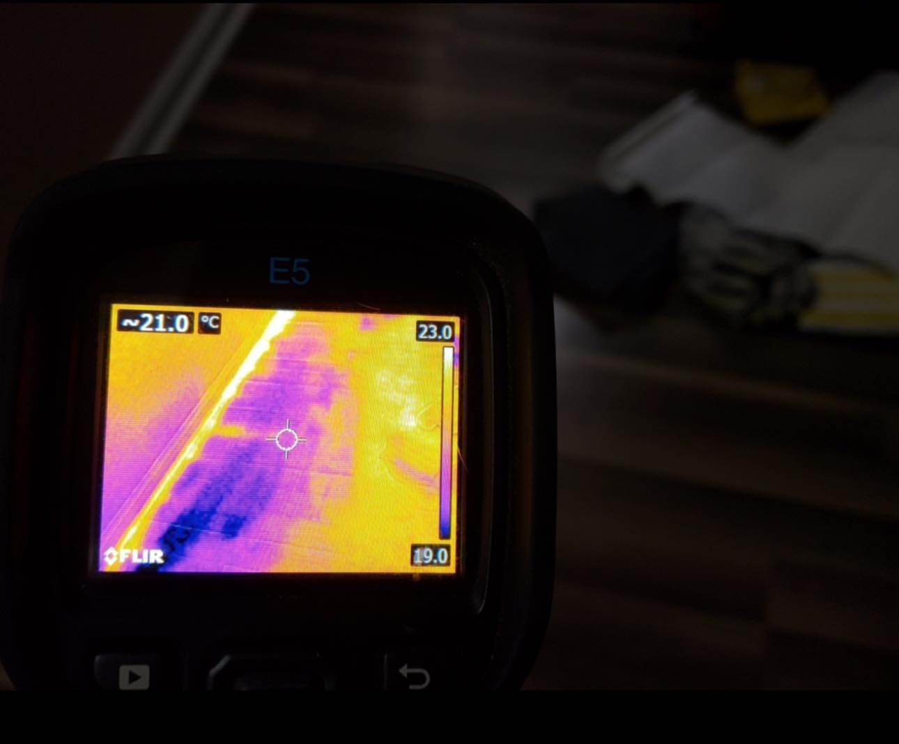 FLIR thermal imaging camera used by Carolina Pro Restoration to detect hidden moisture during water damage inspection in Fort Mill, SC