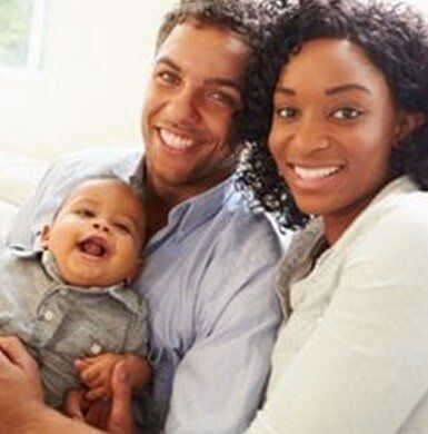 Happy Family — Family Dental Center in Cambria Heights, NY