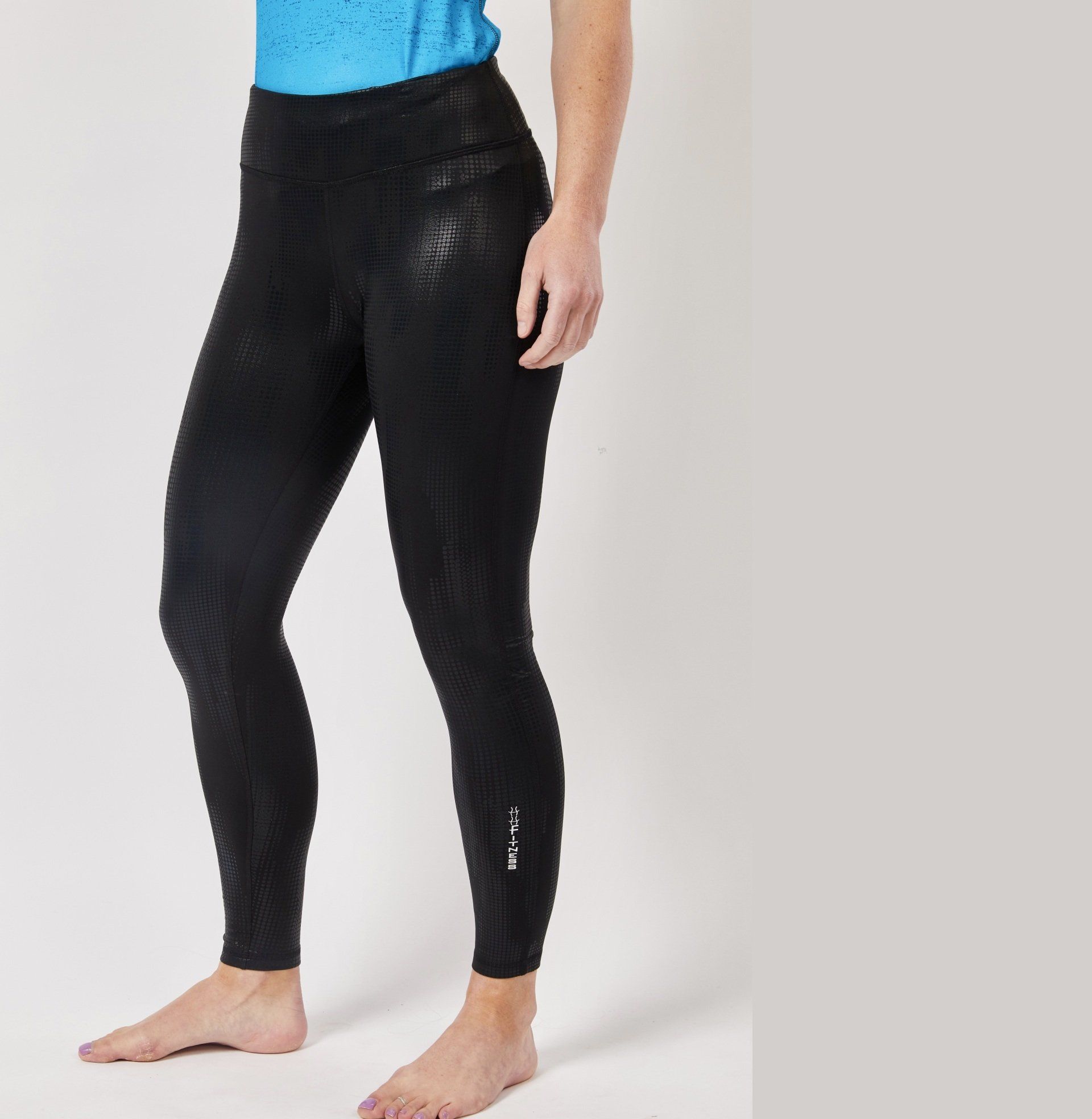 lady wearing black leggings activewear designed by Australian company