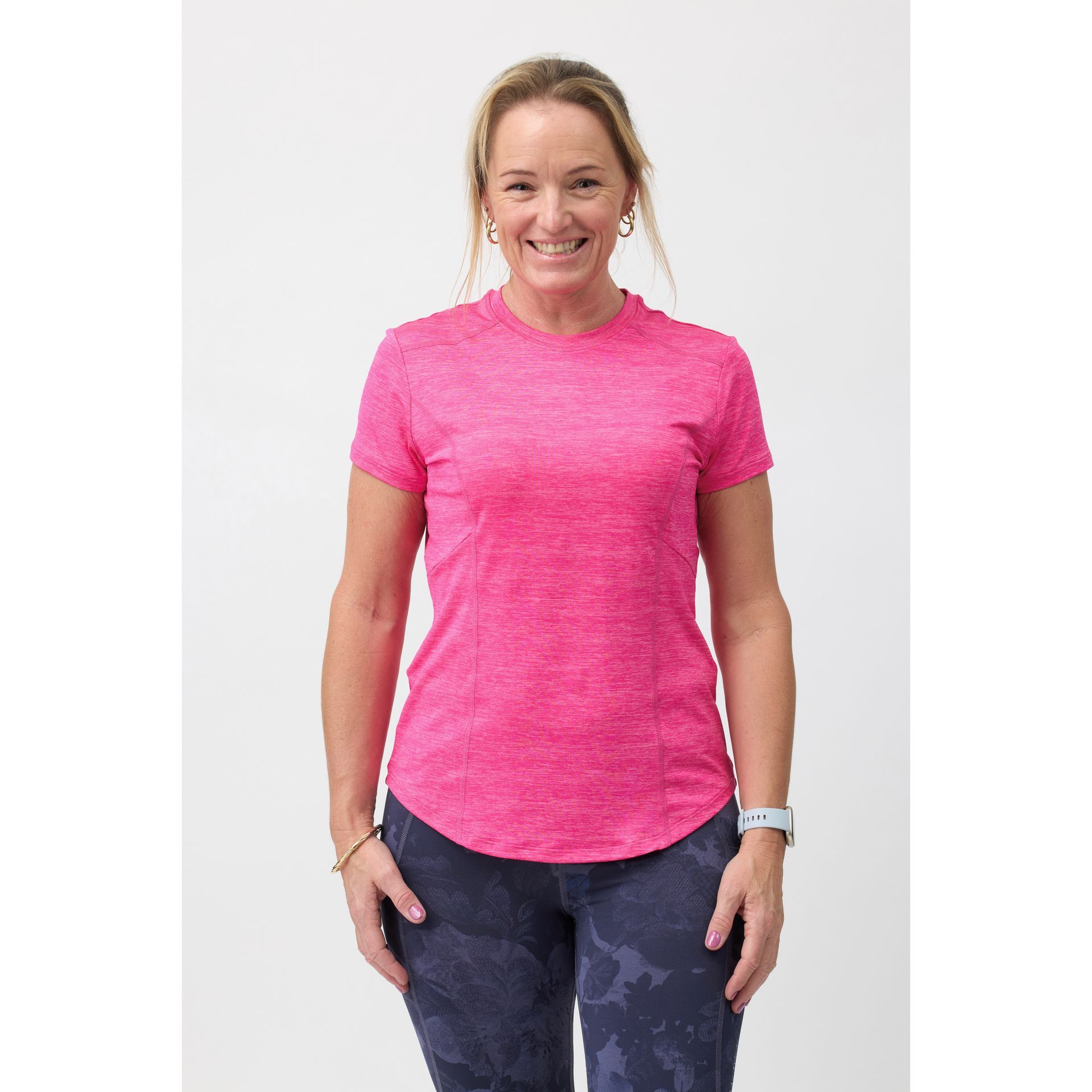 Lady dressed in bright coloured tailored fitting top from Happy Healthy Fitness
