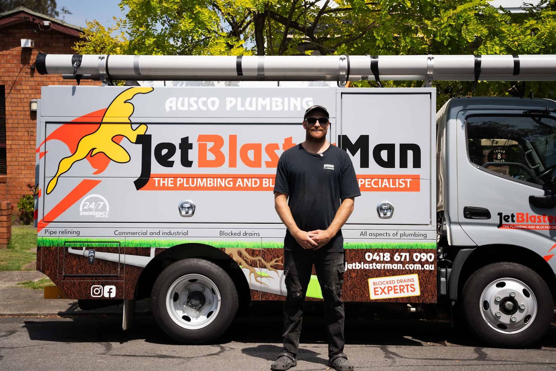 Jet Blaster Man's car parked in front of a house